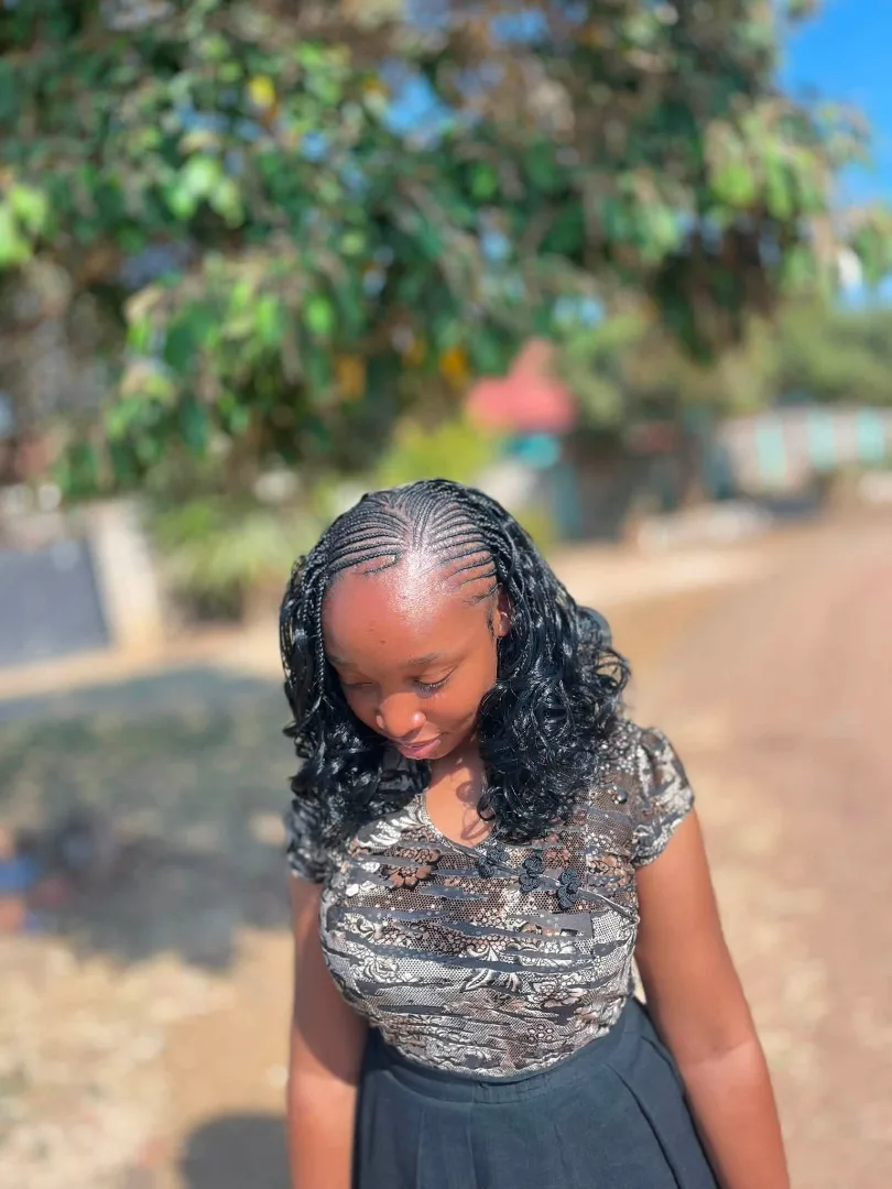 Stylish Cornrow and Curl Hairstyle