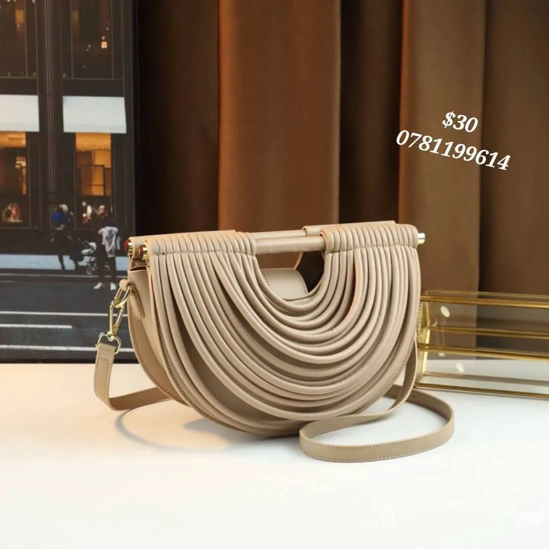 Stylish Beige Handbag with Unique Design