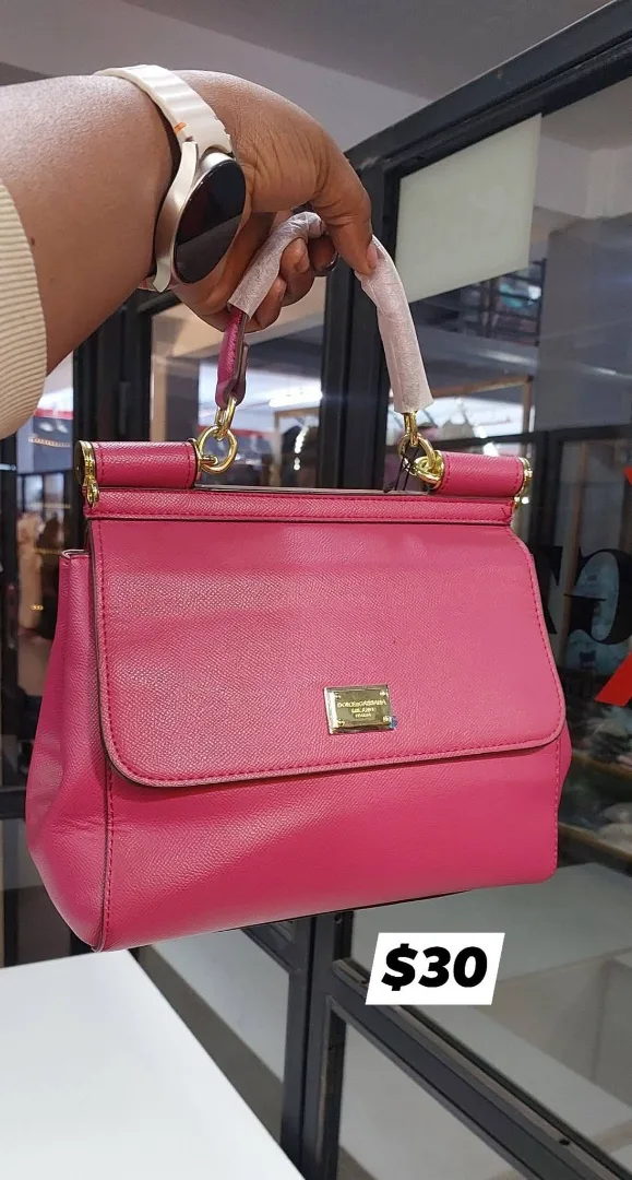 Pink Handbag with Gold Accents